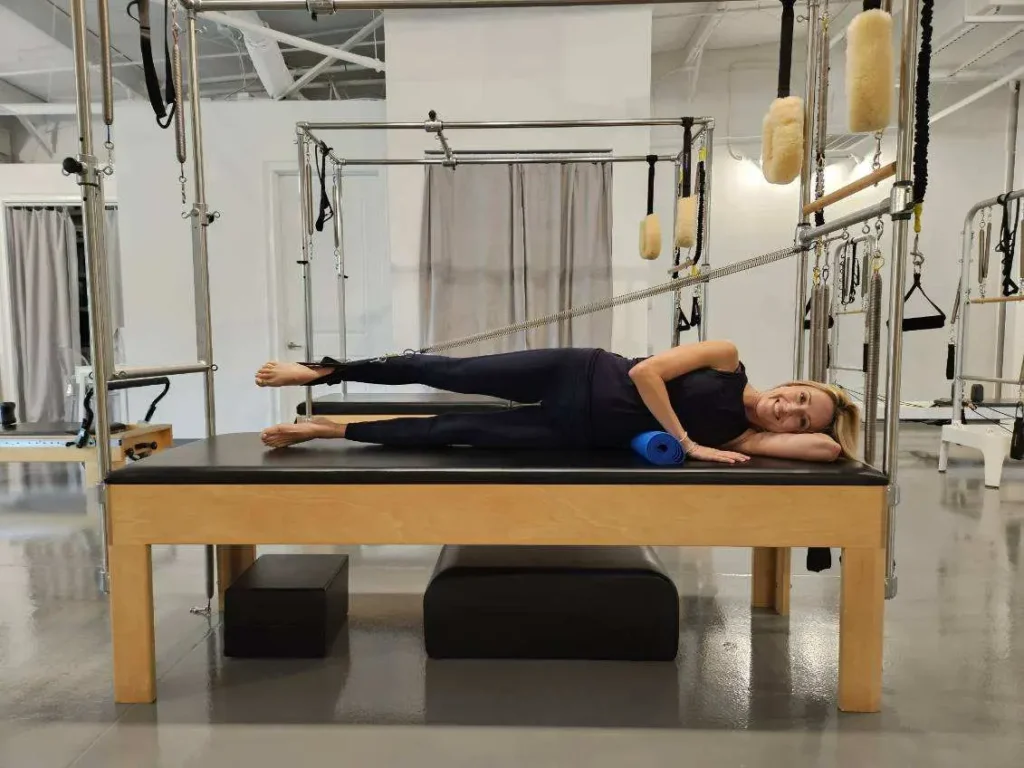 pilates cadillac side lying legs